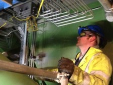 Man inspecting pipes